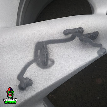 Лечение бордюрной болезни на литых дисках R21 Infiniti FX по технологии Димет